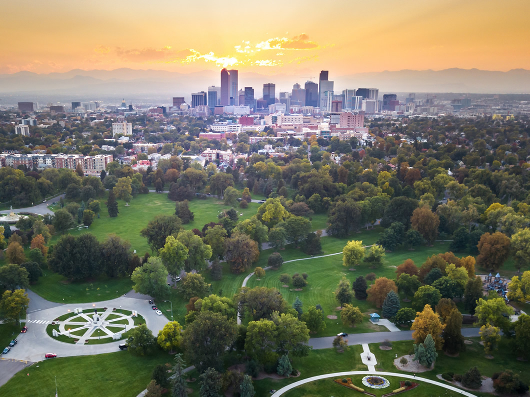 Sunset over Denver cityscape, aerial view from the city park